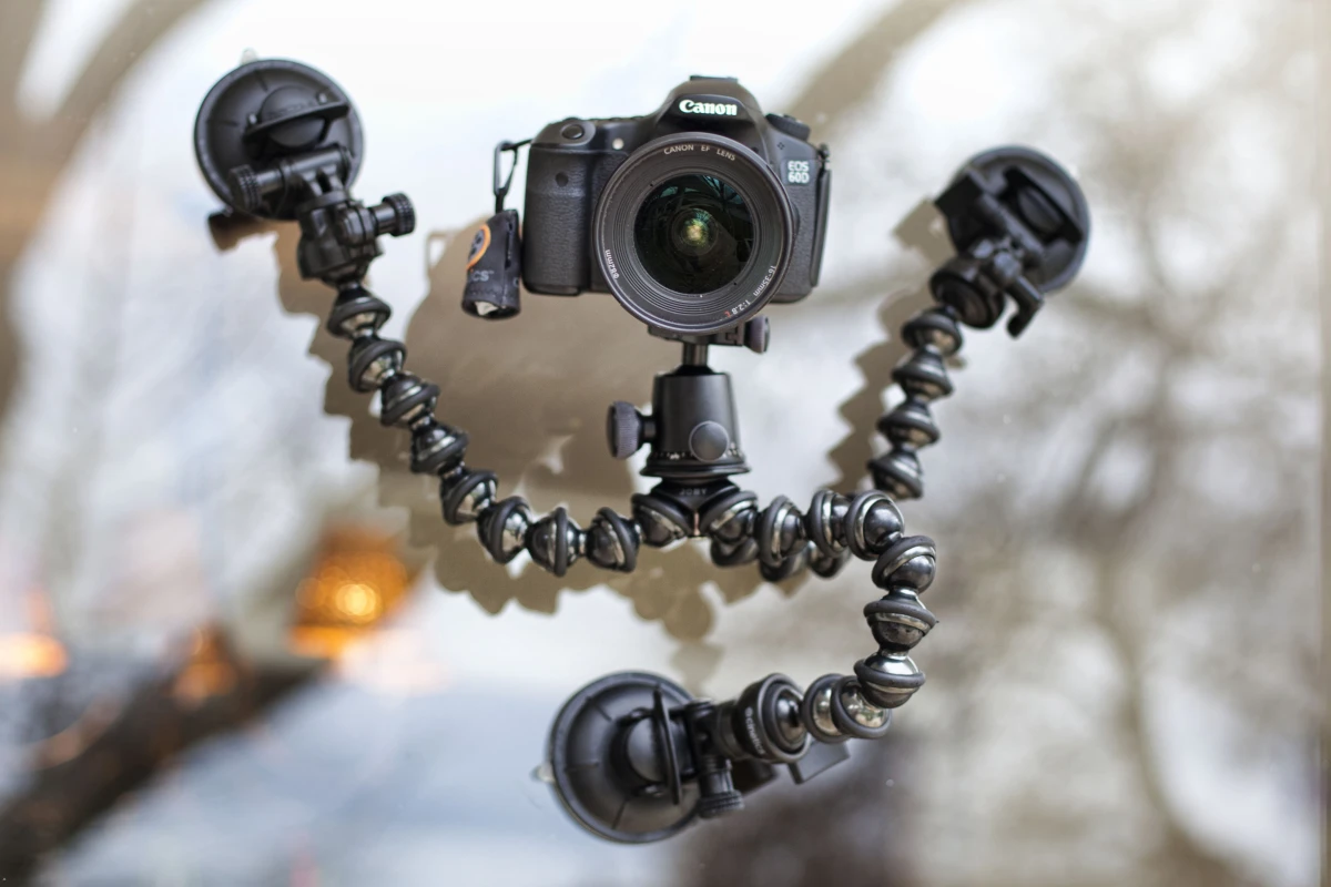 The CineSquid is a tripod system with suction cup feet, allowing small video cameras to be securely mounted on a variety of smooth surfaces