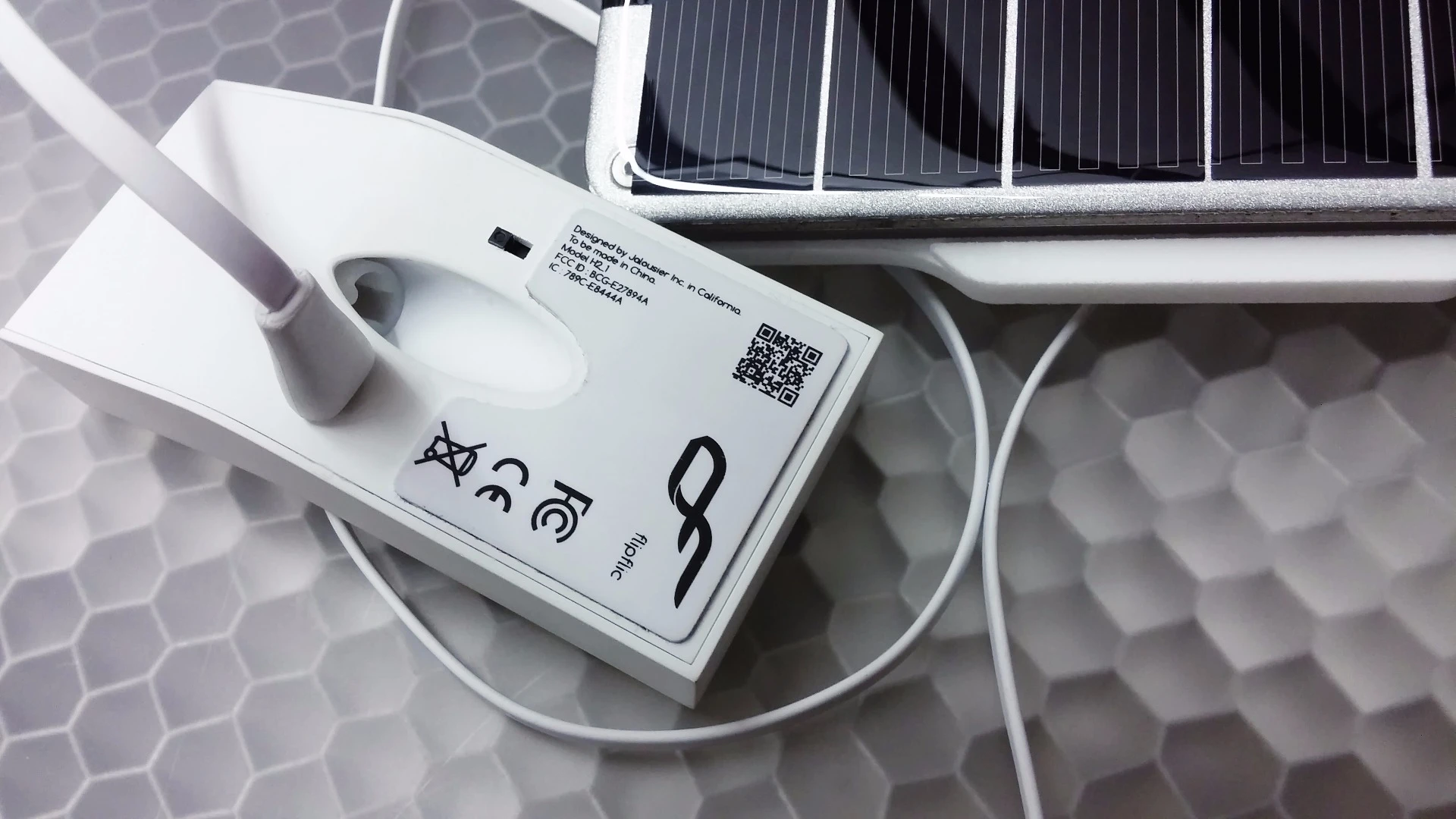 The FlipFlic is provided with a solar panel via which it can be entirely powered