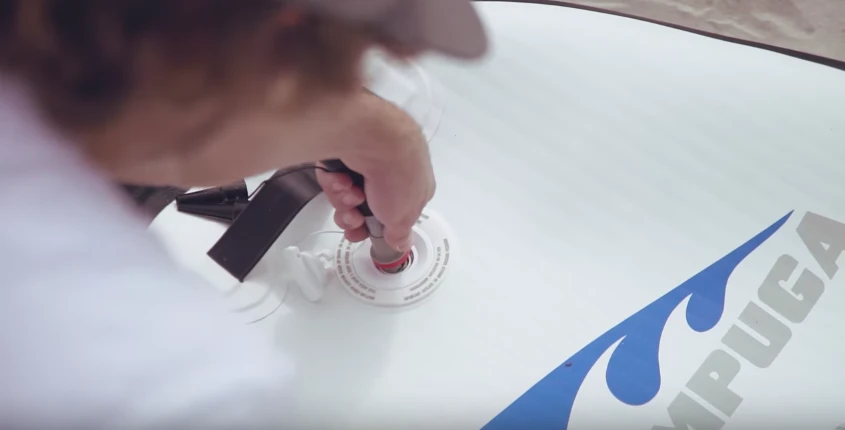 Lampuga shows the board inflating in seconds with an automatic inflator