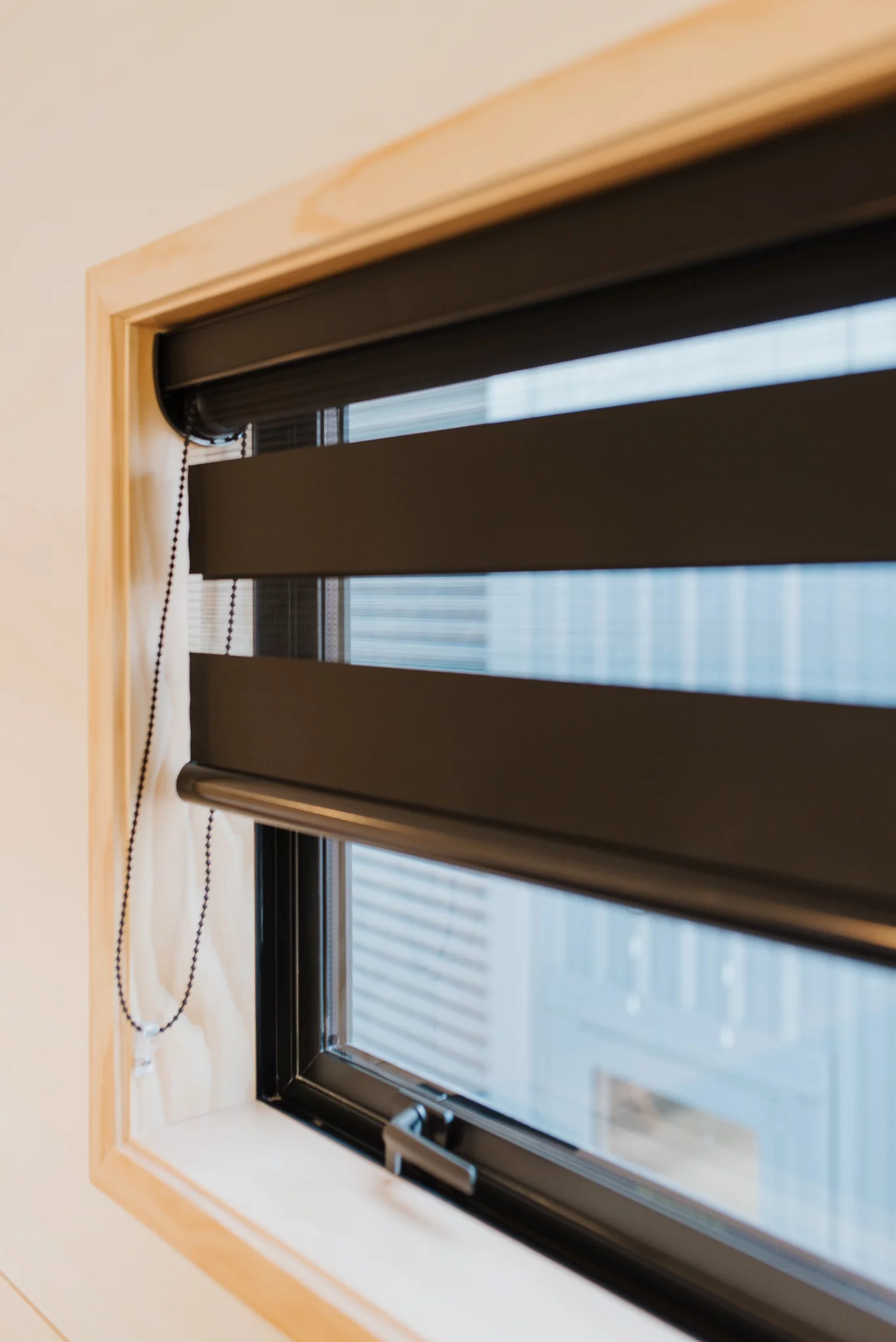 The Dreamweaver Tiny House's windows feature blinds