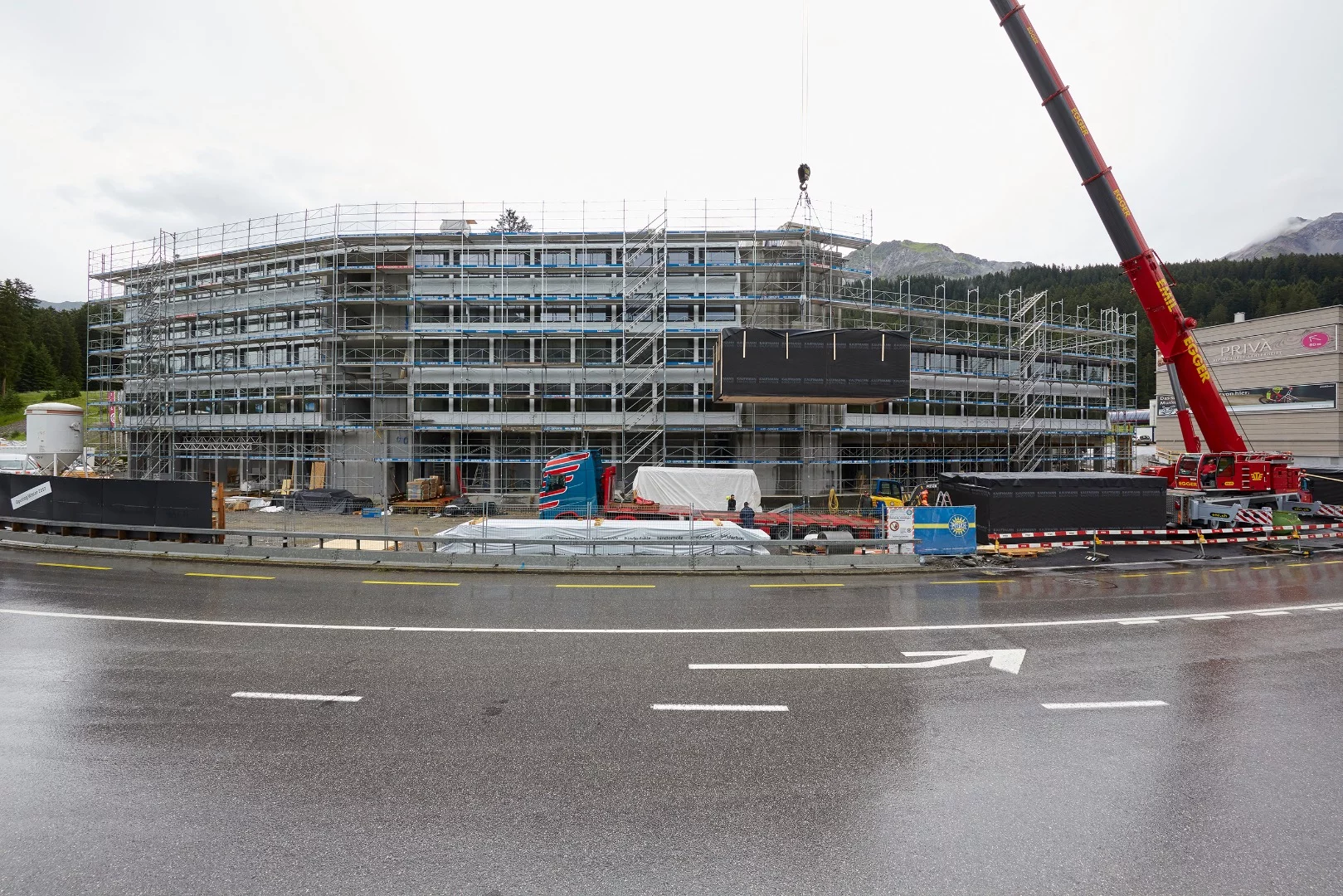 Switzerland's prefab Revier Mountain Lodge under construction