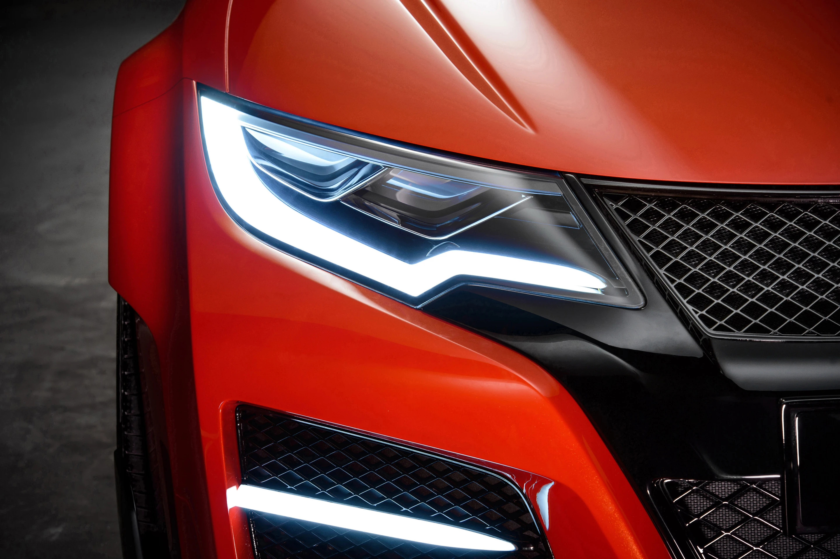 Air outlets on the hood and larger front grilles allow for better cooling of the engine
