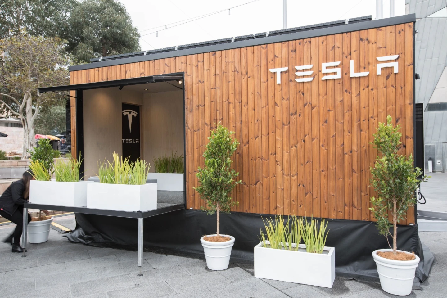 A fold-out balcony lets a bit of light into the Tesla Tiny House