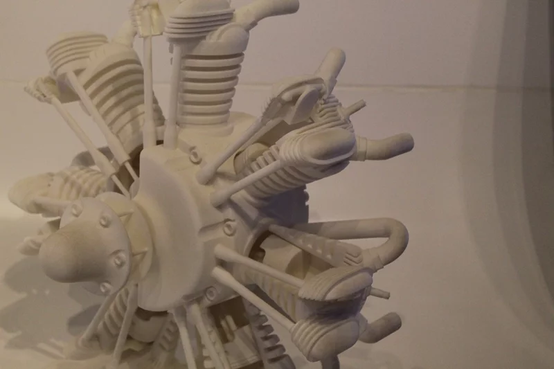 The model engine has a number of moving parts