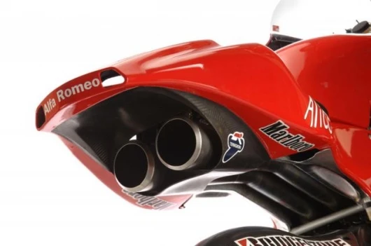 Two of the four exhaust pipes exit through the seat