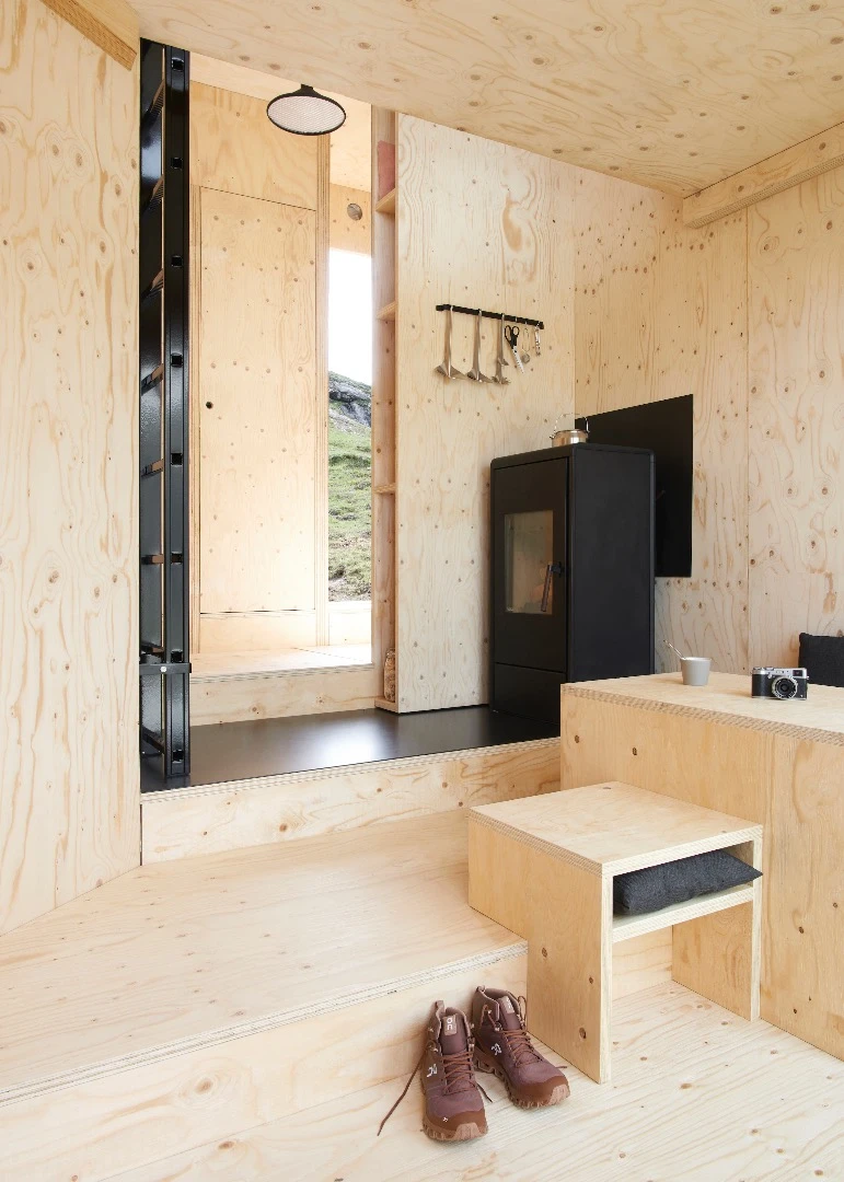 The On Mountain Hut is kept warm with a wood-burning stove
