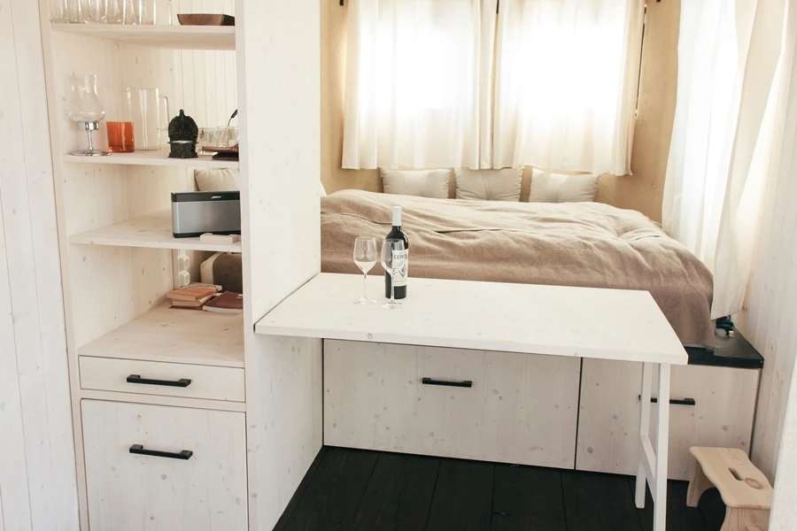 The Wohnwagon uses a fold-out table to conserve space
