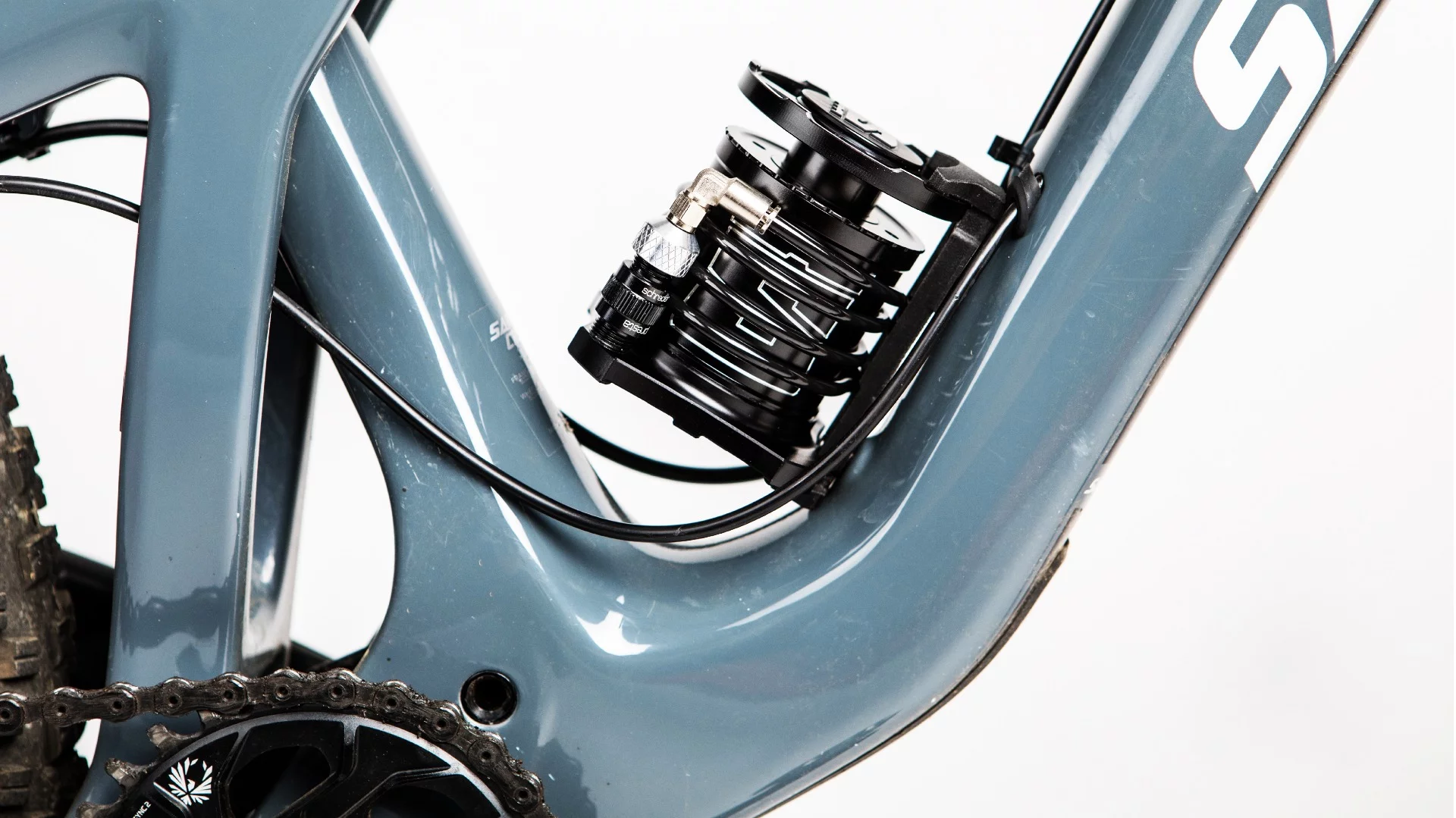 Using an included frame dock and safety strap, the 185-gram Stompump can be mounted on a bike's water bottle bosses