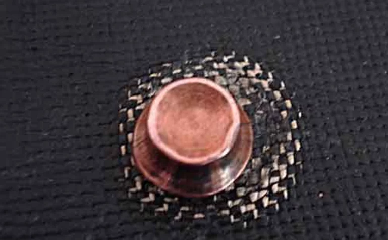 The Diamond Armor suit's bullet-proof fabric was developed by body-armor maker Croshield