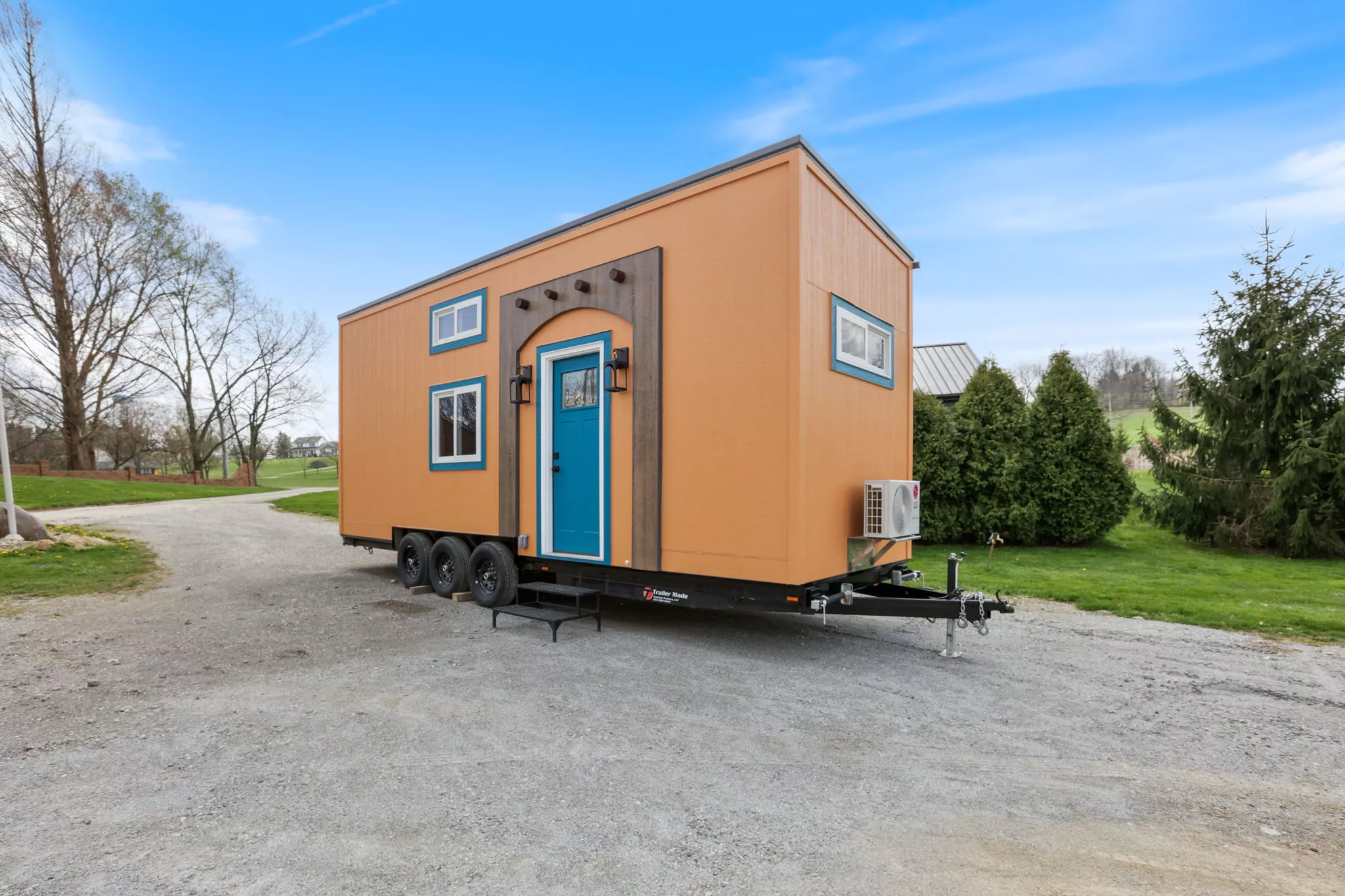 Mi Casita is based on a triple-axle trailer and is finished in a fiber cement board siding, with engineered wood trim