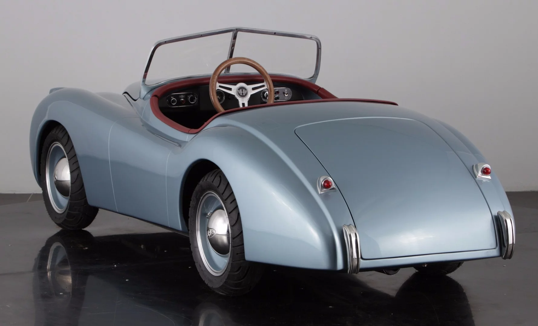 The ex-factory retail prices for the XK120 is £7,999, US$12,399 or €11,299 depending on the customer 's preferred currency, with shipping costs on top of that