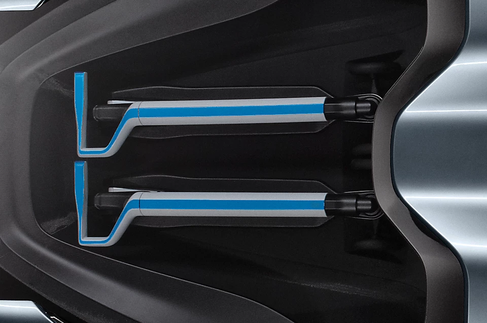 BMW's i8 Spyder with two matching BMW three-wheeled electric kick scooters in the rear