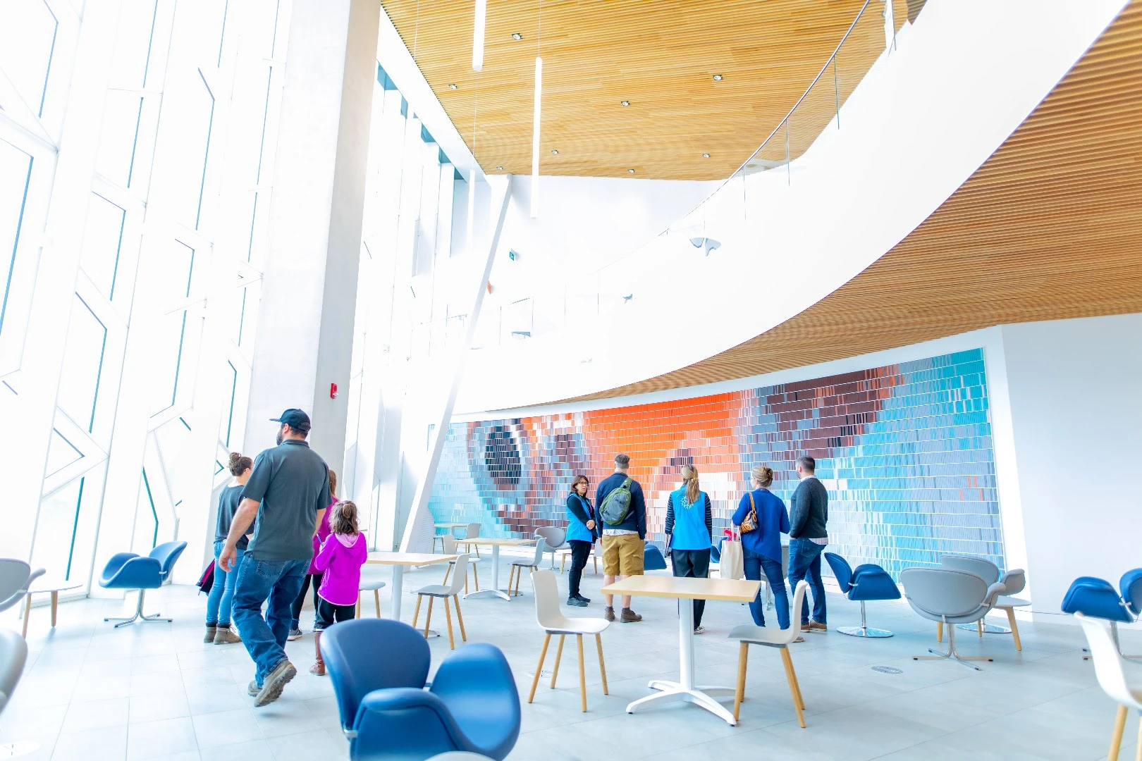 The northernmost point of Calgary Central Library hosts a cafe which overlooks the light rail train line