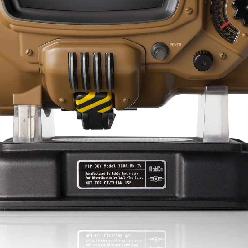 The Pip-Boy comes with a stand, which has stereo speakers built-in, and can charge the device