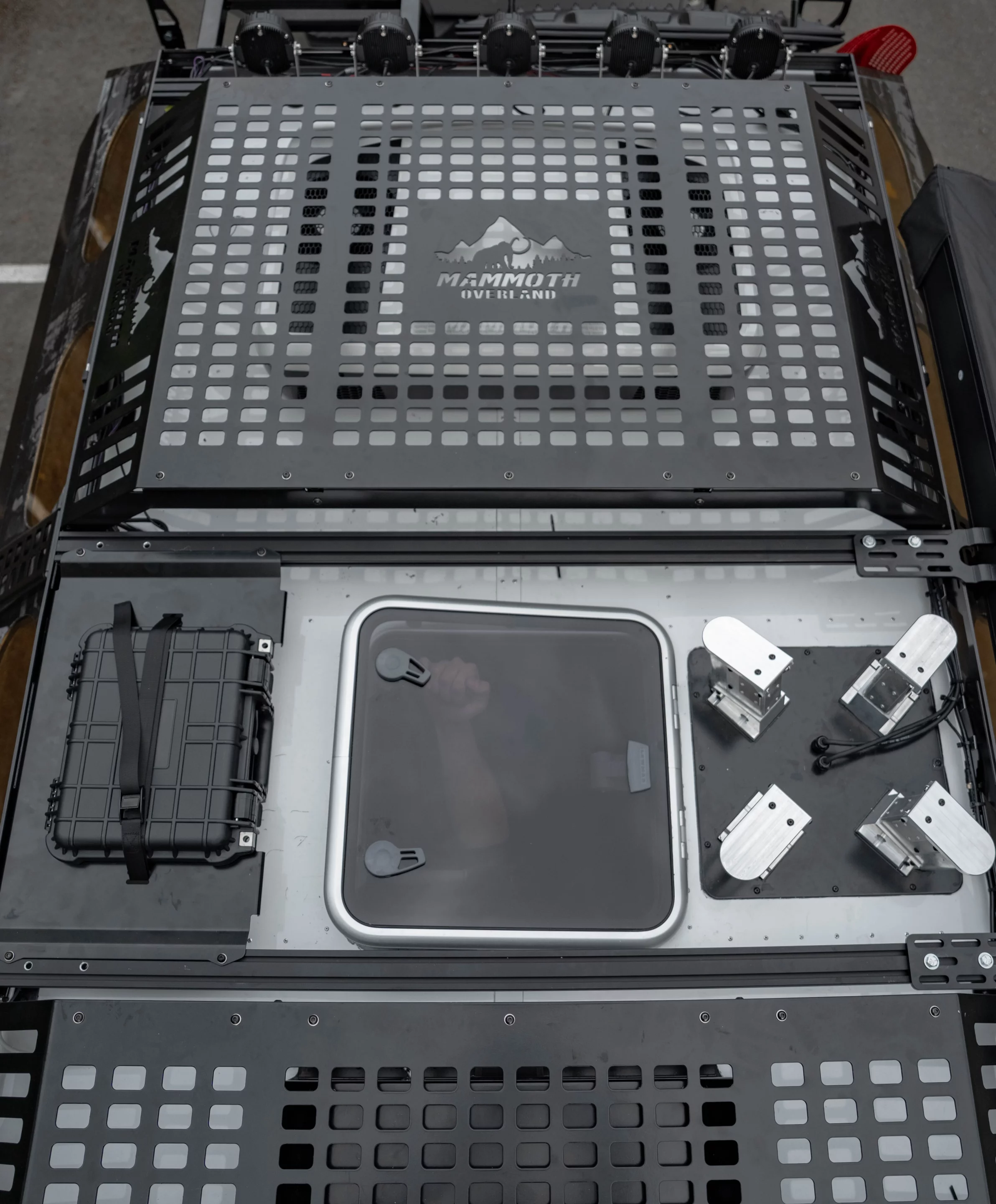 The rooftop includes a rack system/observation decks, along with a central escape hatch