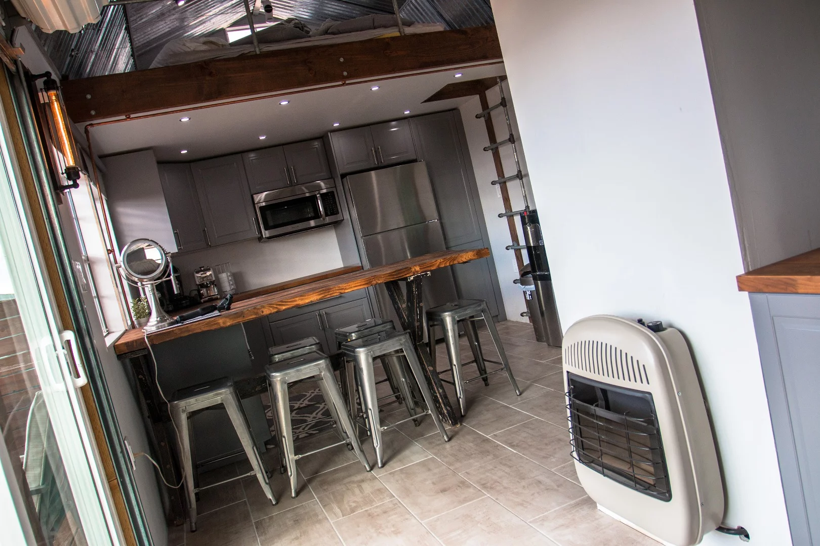 Centrally located, the Liquid Propane Gas heater evenly heats the interior efficiently.