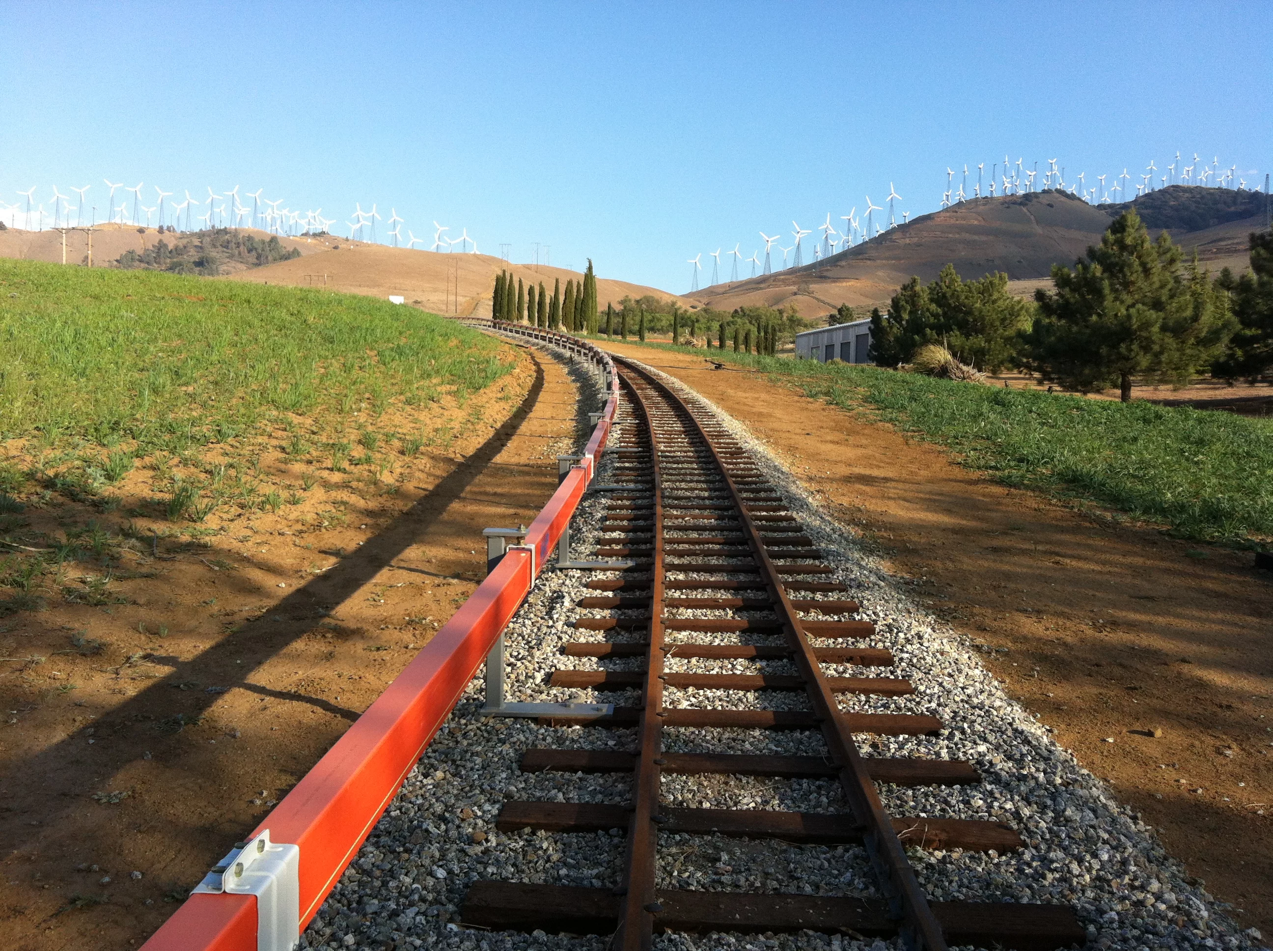 The ARES Tehachapi pilot track with the orange conductor rail on the left