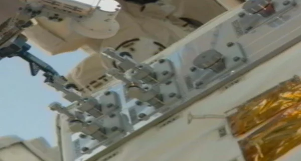 Dextre moves the RRM Wire Cutter Tool into place (Image: NASA)