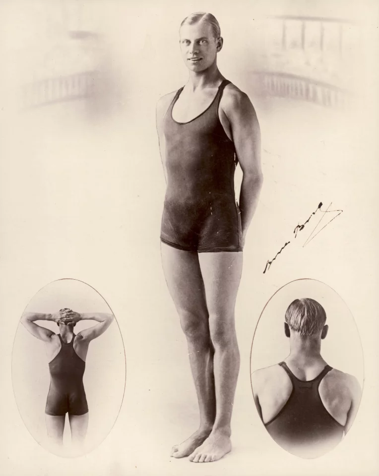 Black and white photograph of Swedish champion swimmer Arne Borg wearing a Speedo one-piece tank-style swimsuit. The swimsuit features the "racer back" design developed by Speedo. Arne Borg was one of the dominant swimmers of the 1920s, setting 32 world records in swimming between 1921 and 1929 (Photo: Powerhouse Museum)