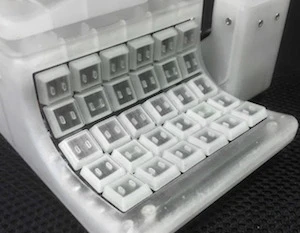 The device uses Cherry ML mechanical keyboard switches and key-mapping can be configured in-browser and stored on each device's Atmel AT90USB128 chip