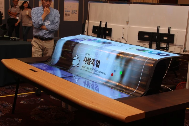A 77-inch flexible screen for your smart desk, sir?