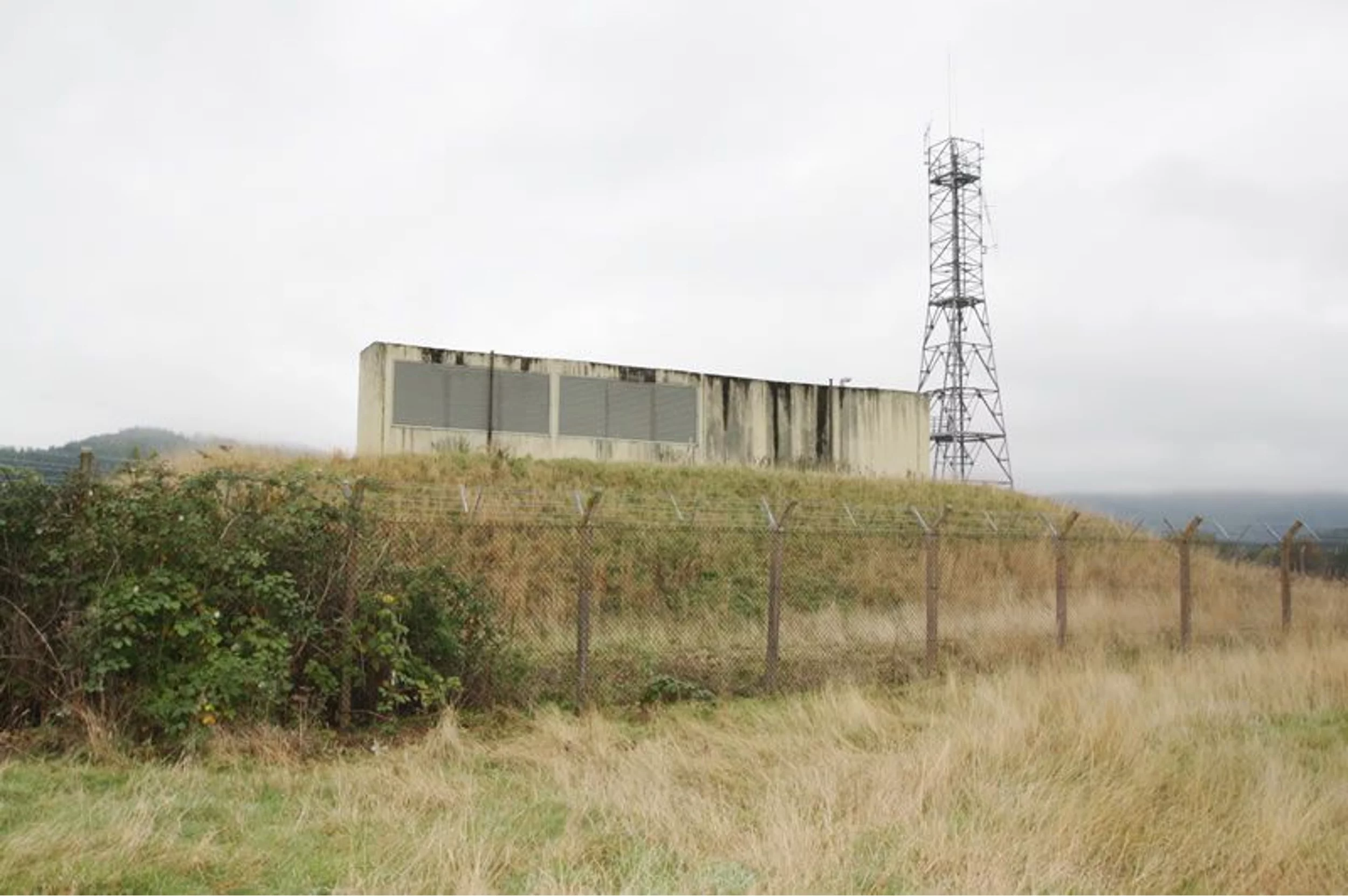 The Cultybraggan shelter is marked by a ventilator and radio mast