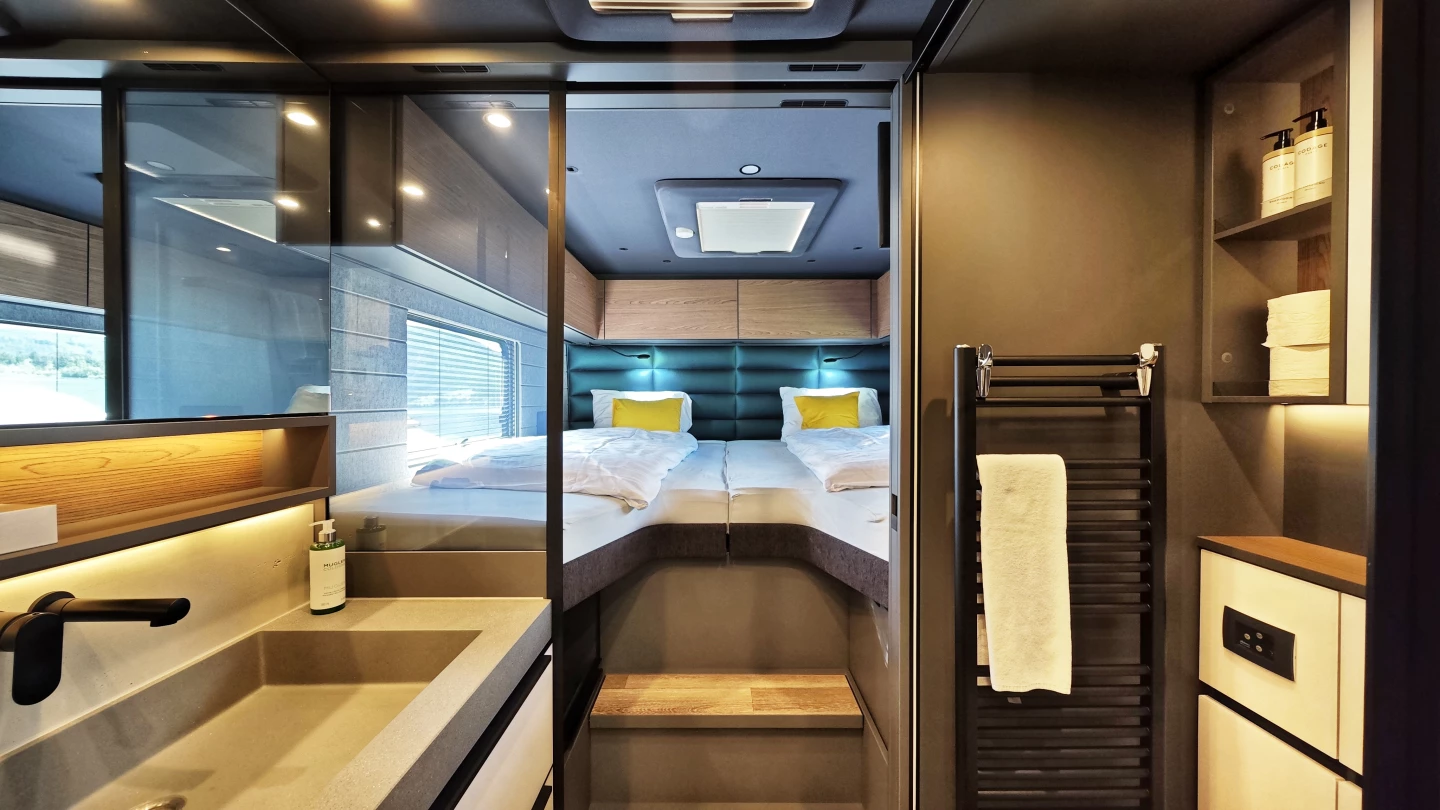The Arto 88 features an aisle-spanning en suite bathroom with separate toilet, shower and sink areas