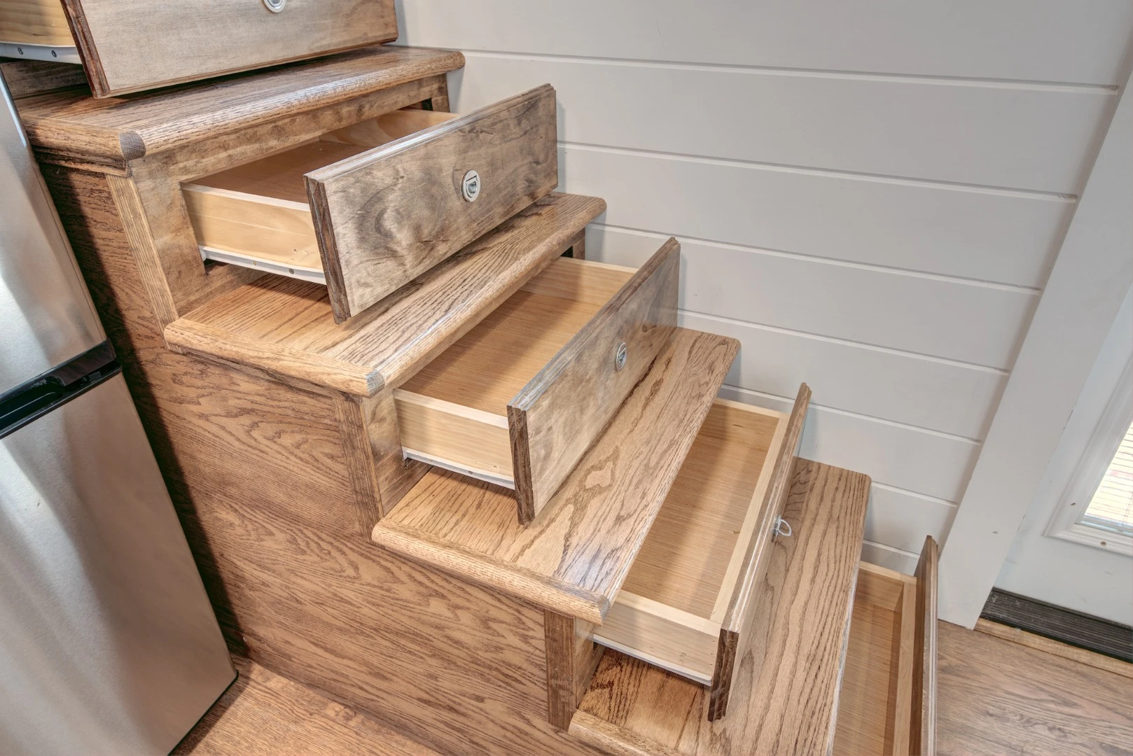 Drawer-style staircase inside the Journey tiny house