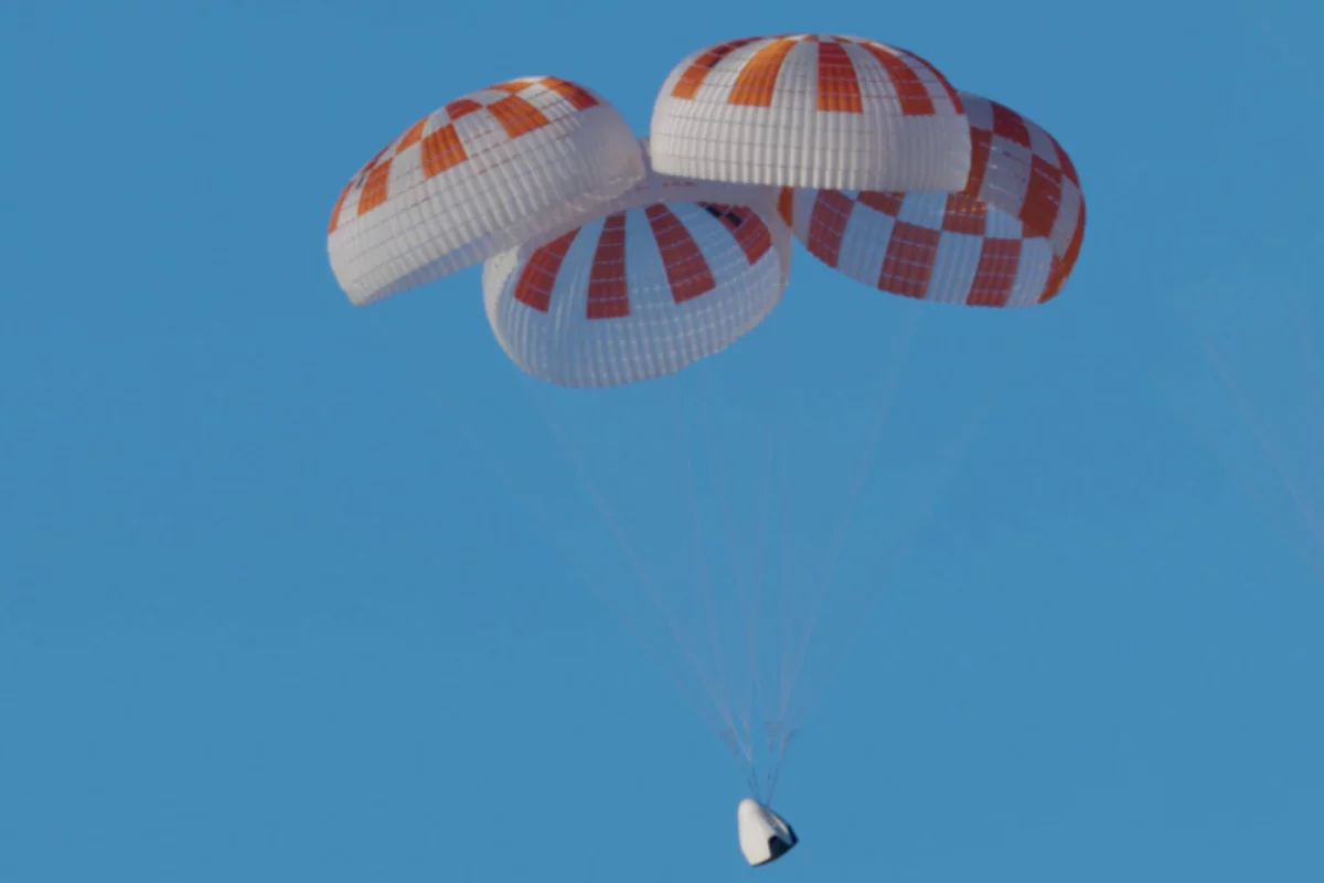 SpaceX's parachute system for the Crew Dragon spacecraft during earlier testing