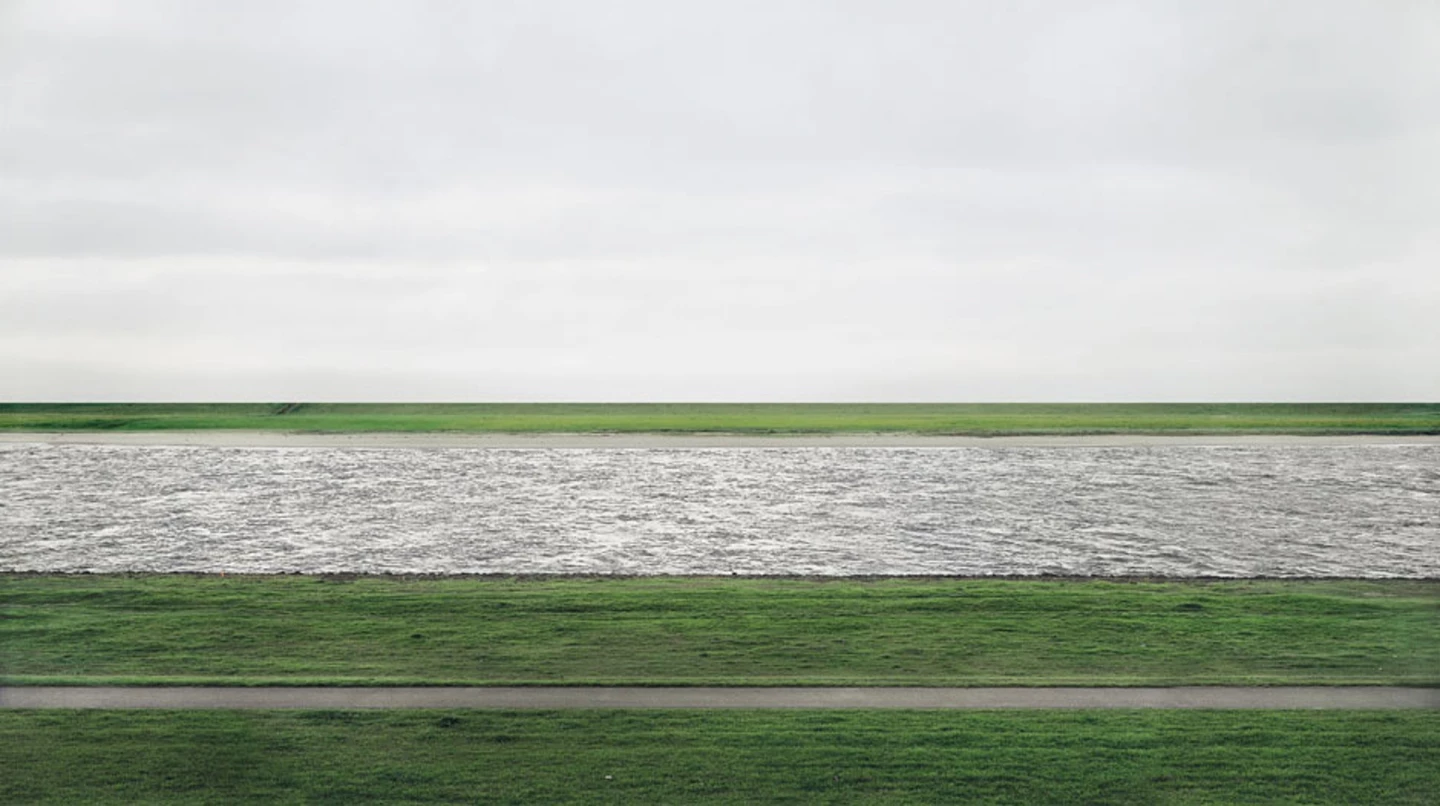 The world record price at auction for a photograph Rhein II, taken in 1999 by Andreas Gursky. A print measuring 73 by 143 inches (190 cm × 360 cm) sold for US$4,338,500 at a Christie's auction in November, 2011.