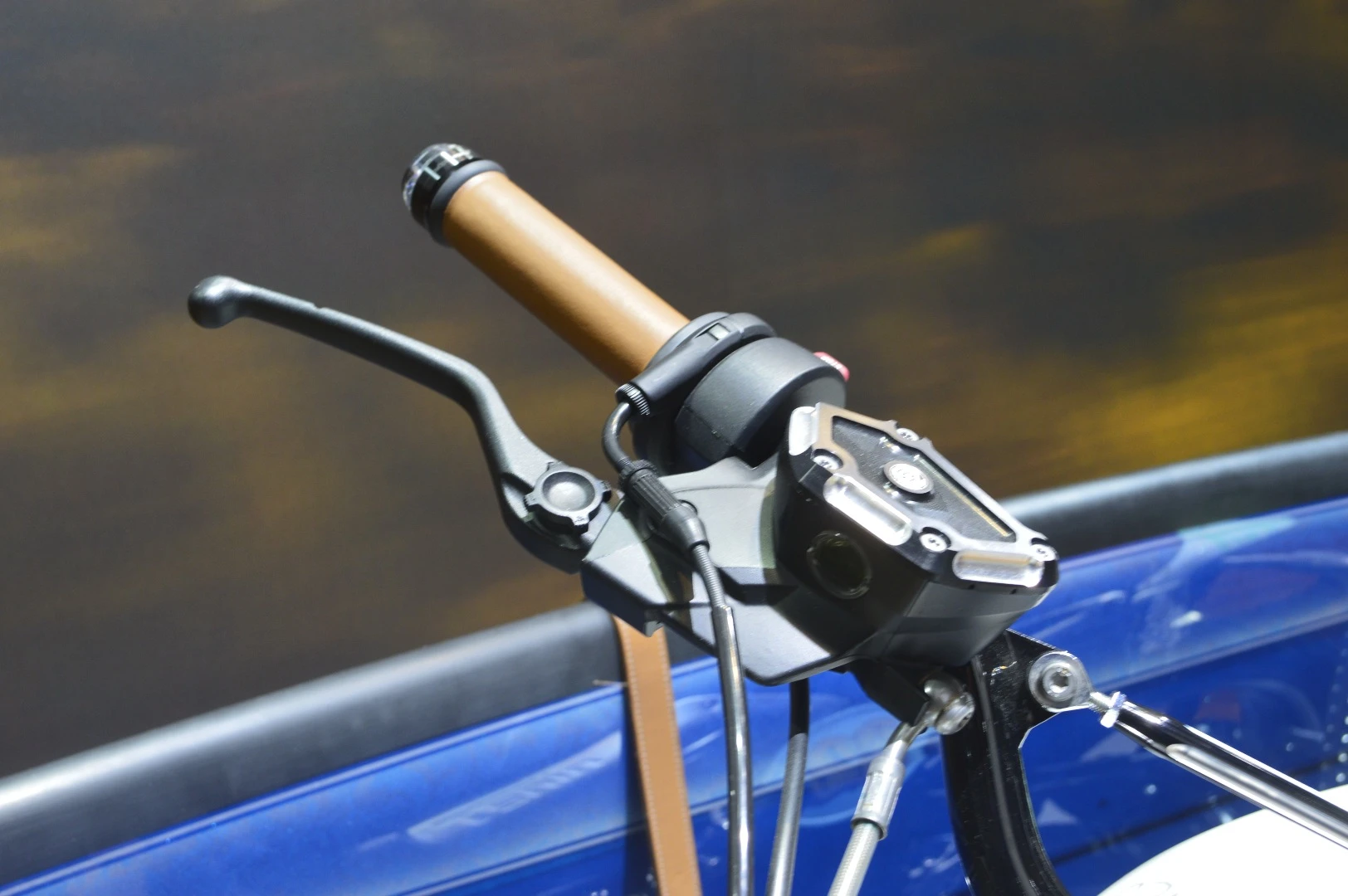Leather lined grips by Motogadget and a designer brake fluid reservoir by Roland Sands for the BMW Concept Path 22