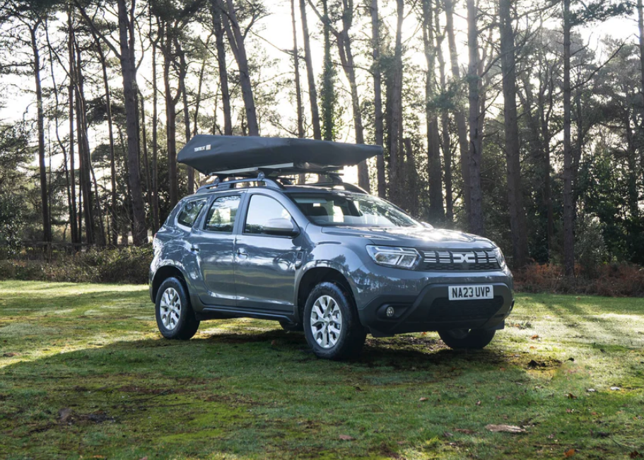 The wedge shrinks and reverses sides when closed, with the higher end at the rear of the vehicle for better aerodynamics