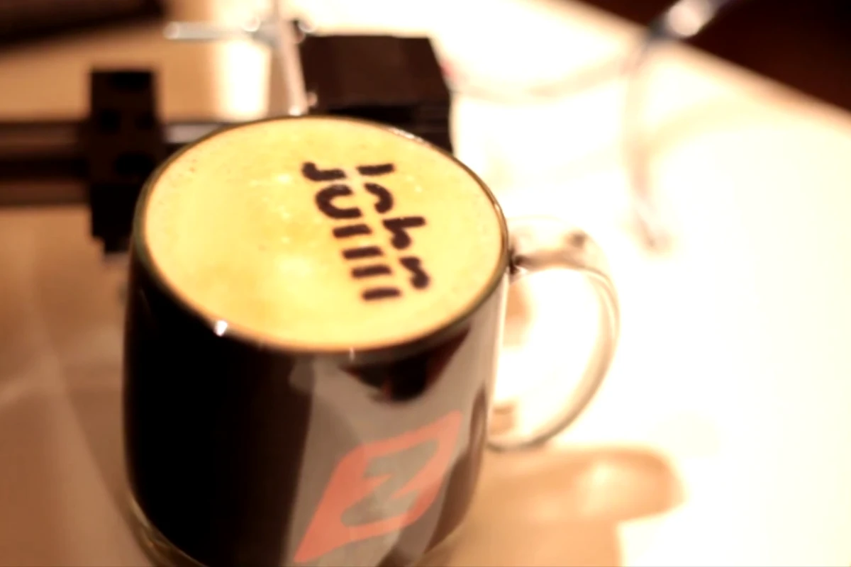 A start-up in Seattle has created the "Textspresso," a coffee machine that accepts and prepares specialized coffee orders via text message and will soon also print directly onto the coffee's top layer of cream