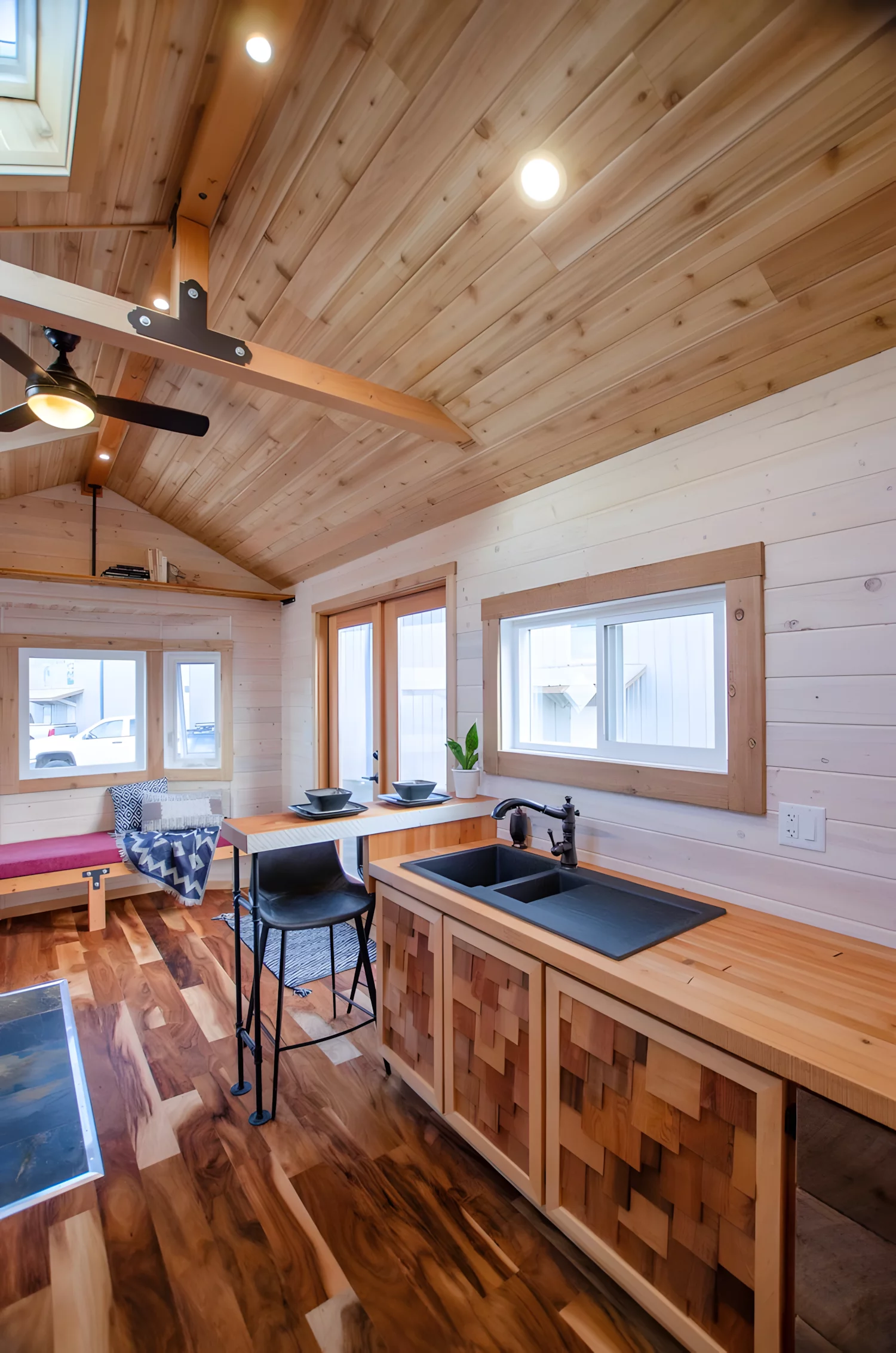 The Huckleberry's kitchen features custom cabinetry, including cedar shingles that match those on the exterior of the home