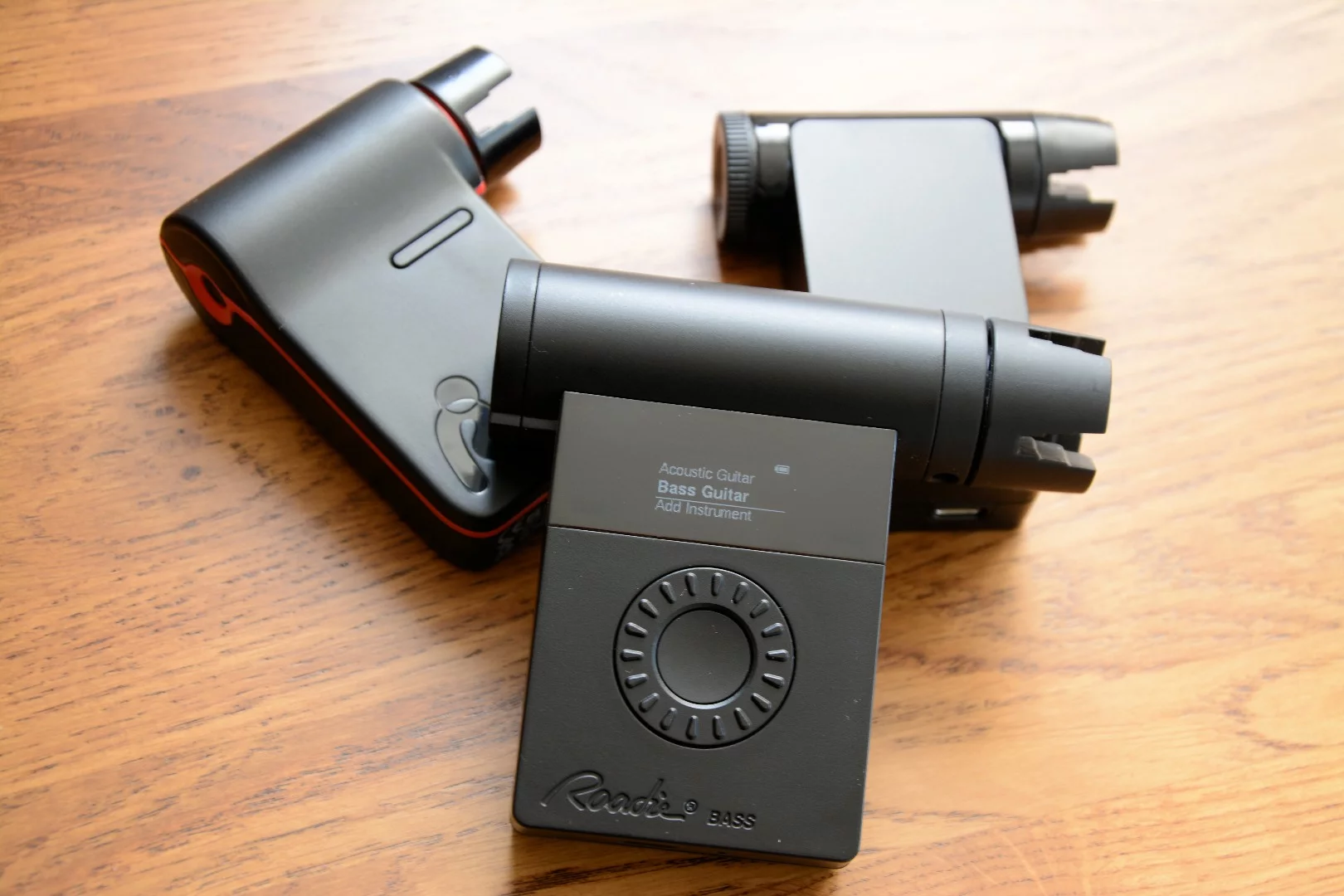 The Roadie Bass is much chunkier than the Roadie 2 (back left) and the original Roadie (back right)