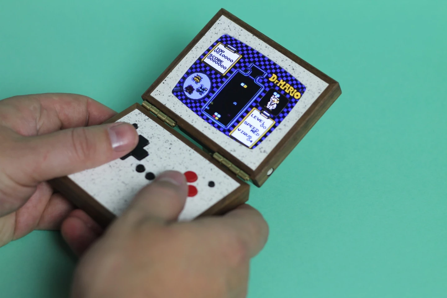 Love Hultén has added some faux luna pearl granite to the Pixel Vision 2.0 pocket console for a little texture