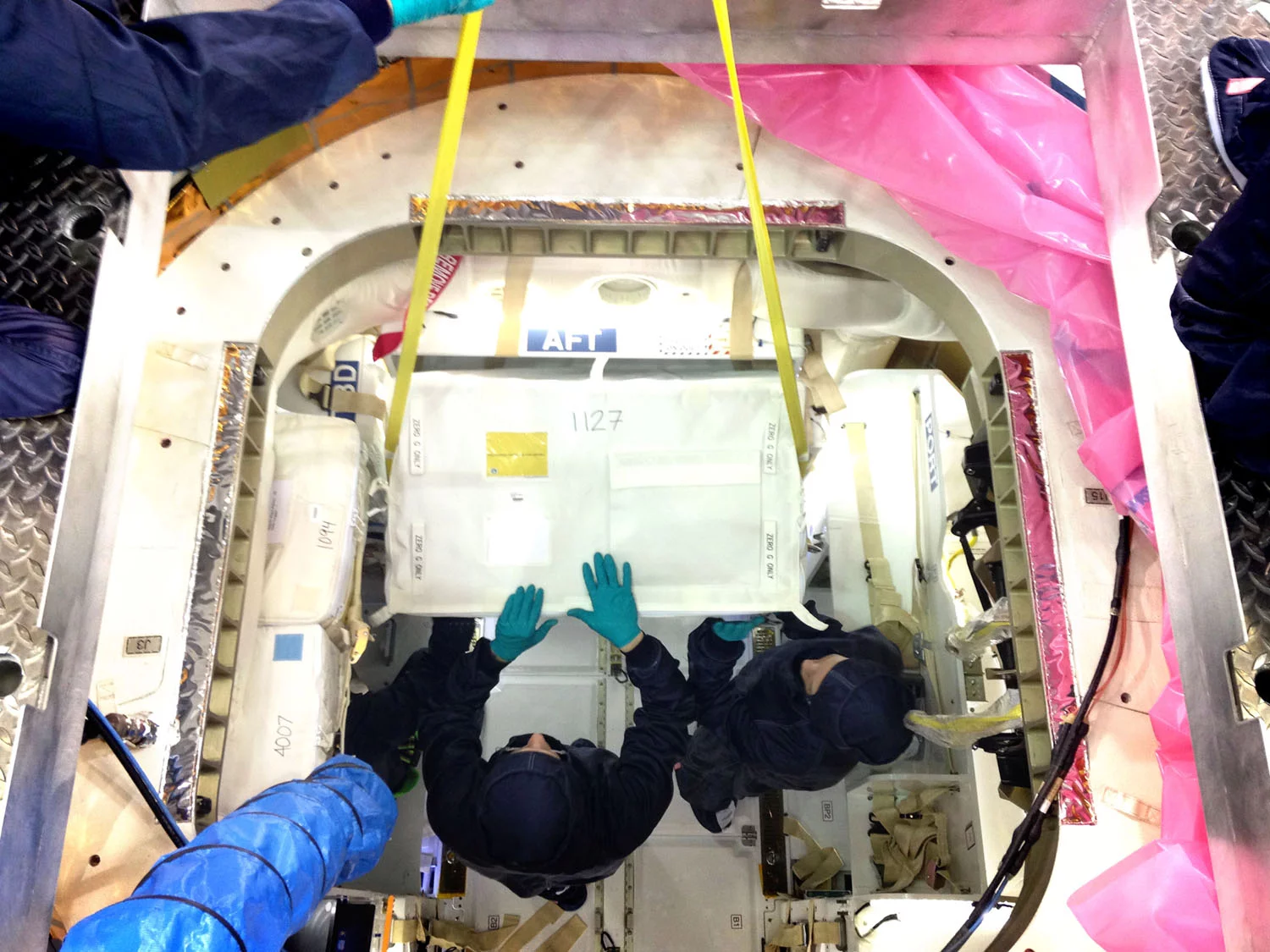 Cargo is loaded into Dragon's pressurized section