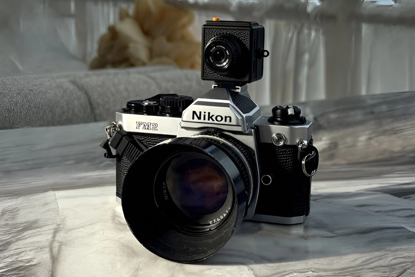 The Ligar camera (top) captures digital copies of images taken by a host film camera