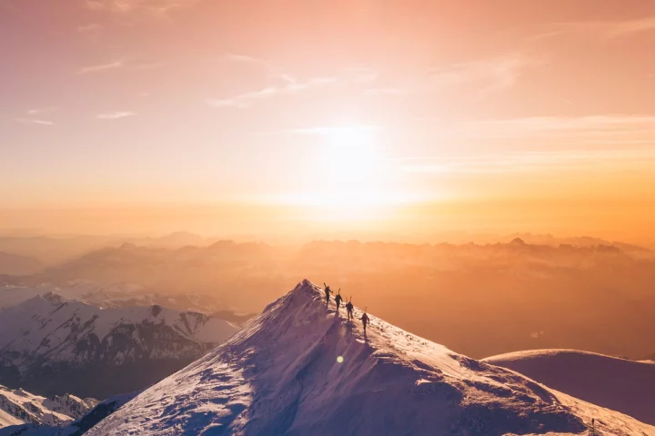 Another Nominated Entry prize winner, several skiers walk the summit of Mont Blanc before skiing down the north face