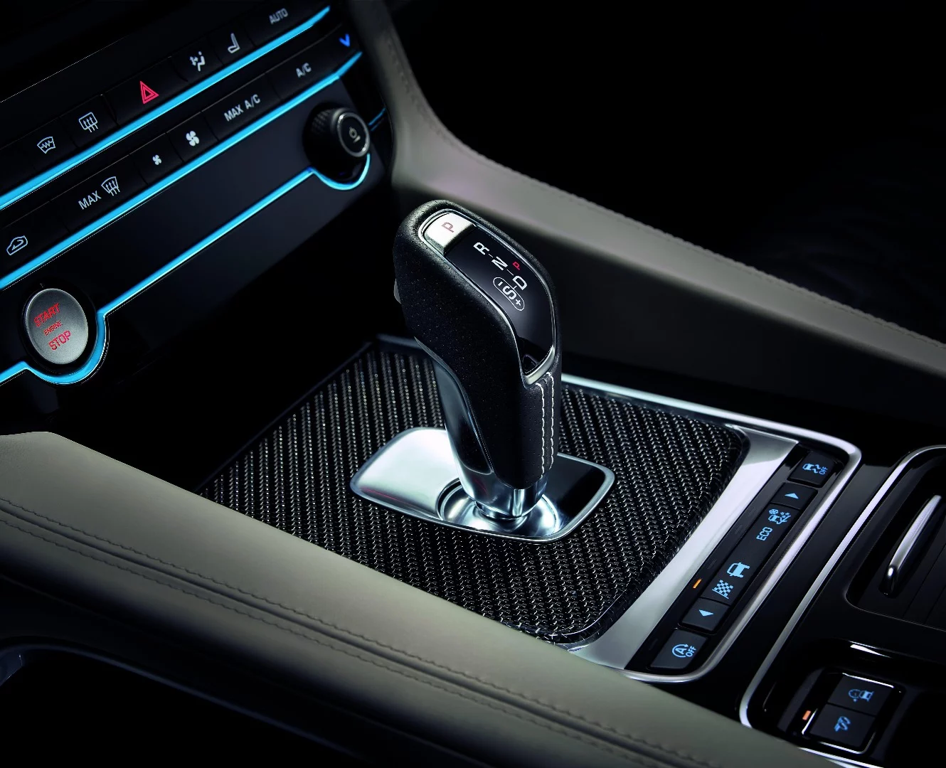 The SVR package drops a traditional shifter in for the rotary knob found on other F-Pace models