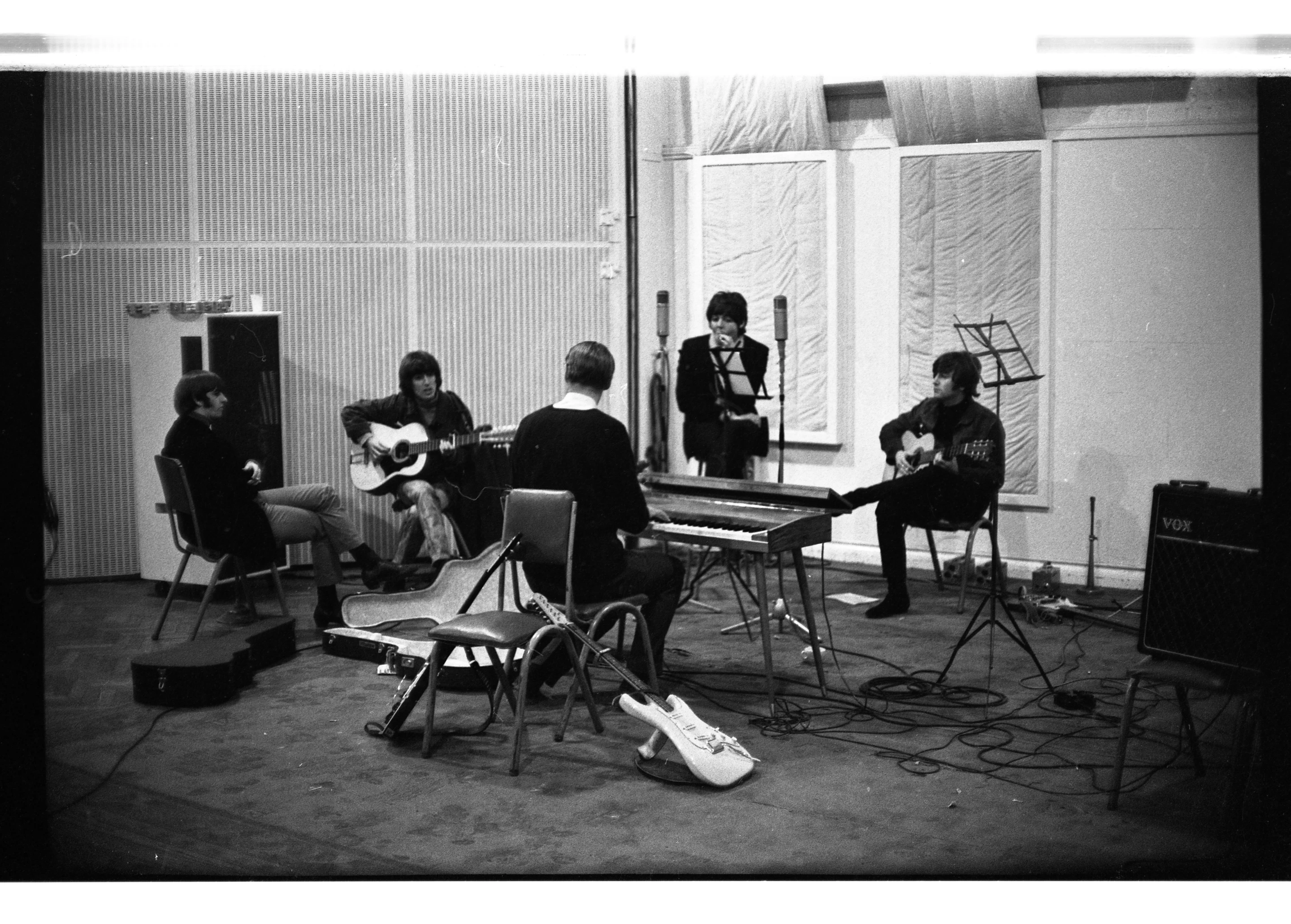 The Beatles in the studio, with the Hootenanny being played by George Harrison on this occasion
