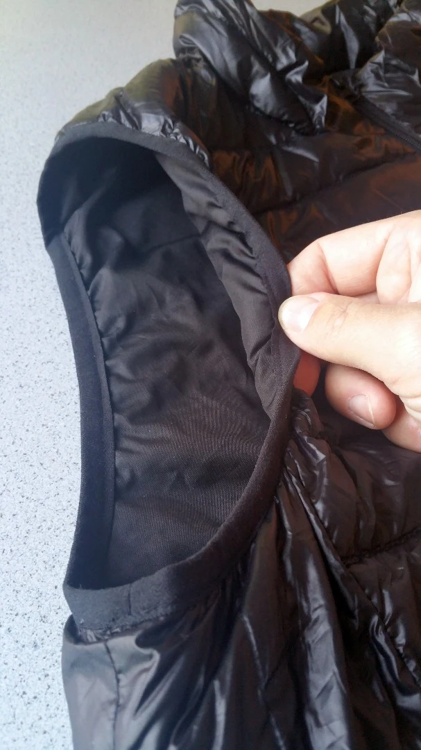 Although the Ravean heated vest's arm openings may feel snug to some, the elastic -filled edges allow full arm/shoulder movement
