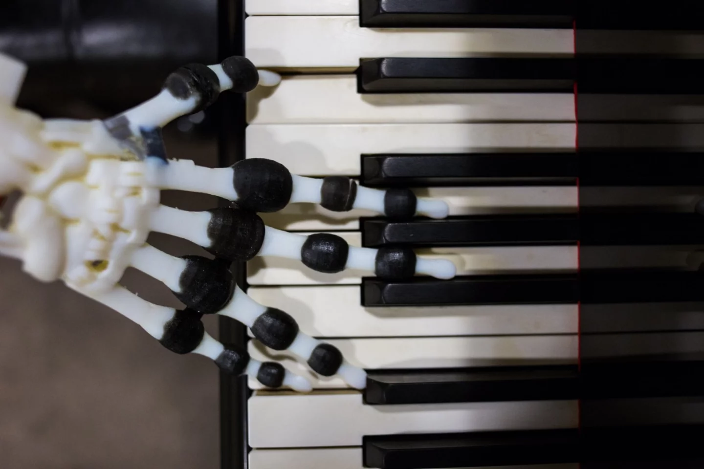 The soft robotic hand isn't going to win any piano playing competitions, but the researchers say that it could lead to the design of robots capable of more natural movement while cutting back on energy use