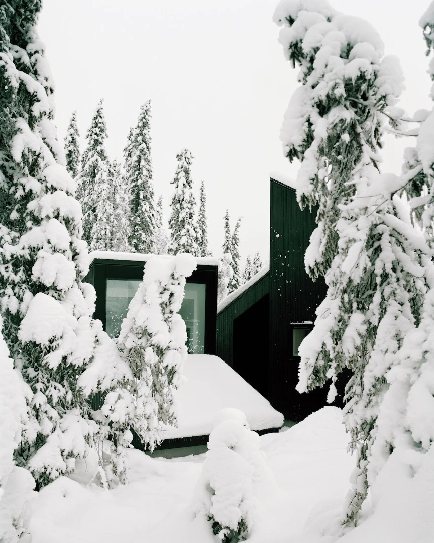 Riffing on the theme of a snowbound cabin with only a roof protruding through the snow, Cabin Vindheim measures 55 sq m (592 sq ft)
