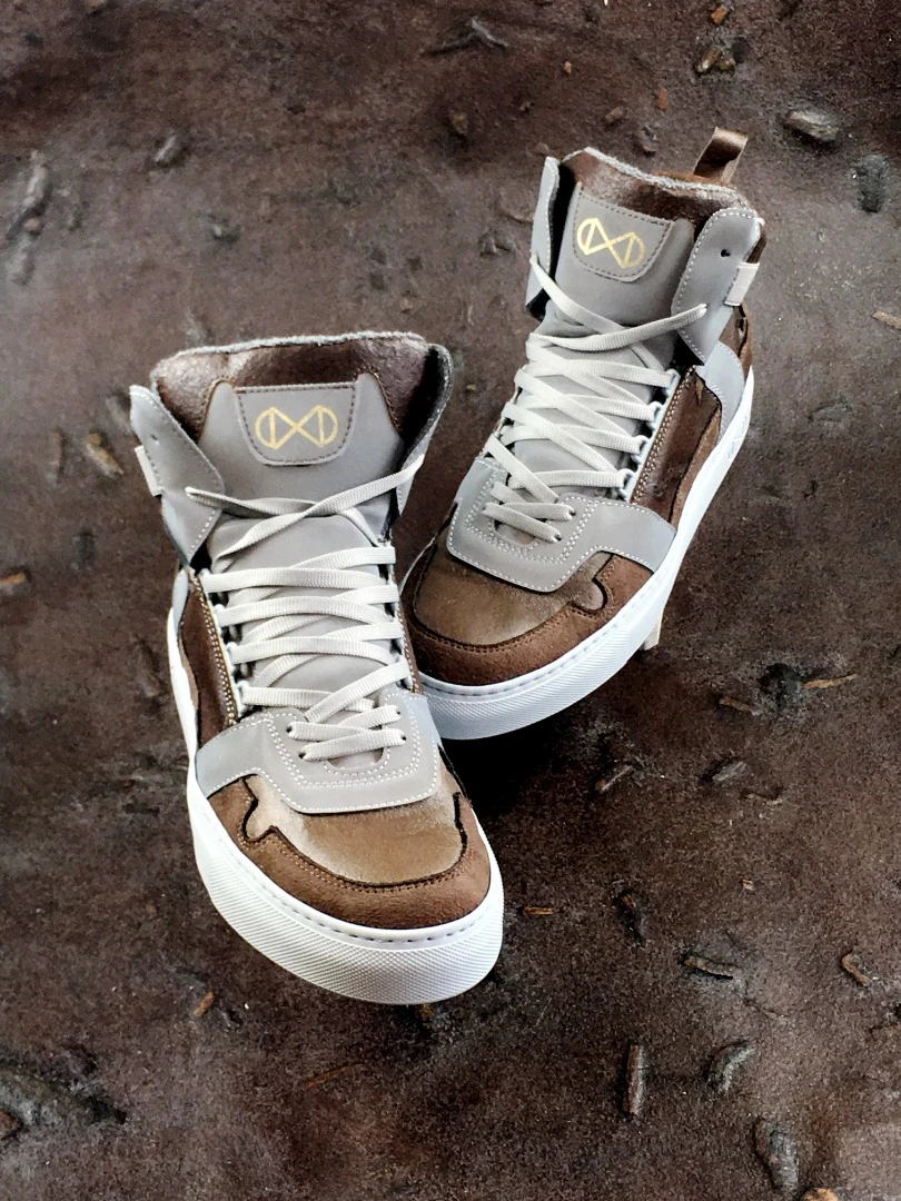 Two nat-2 Coffee line styles are available, the high-tops shown here and a low slung sneaker
