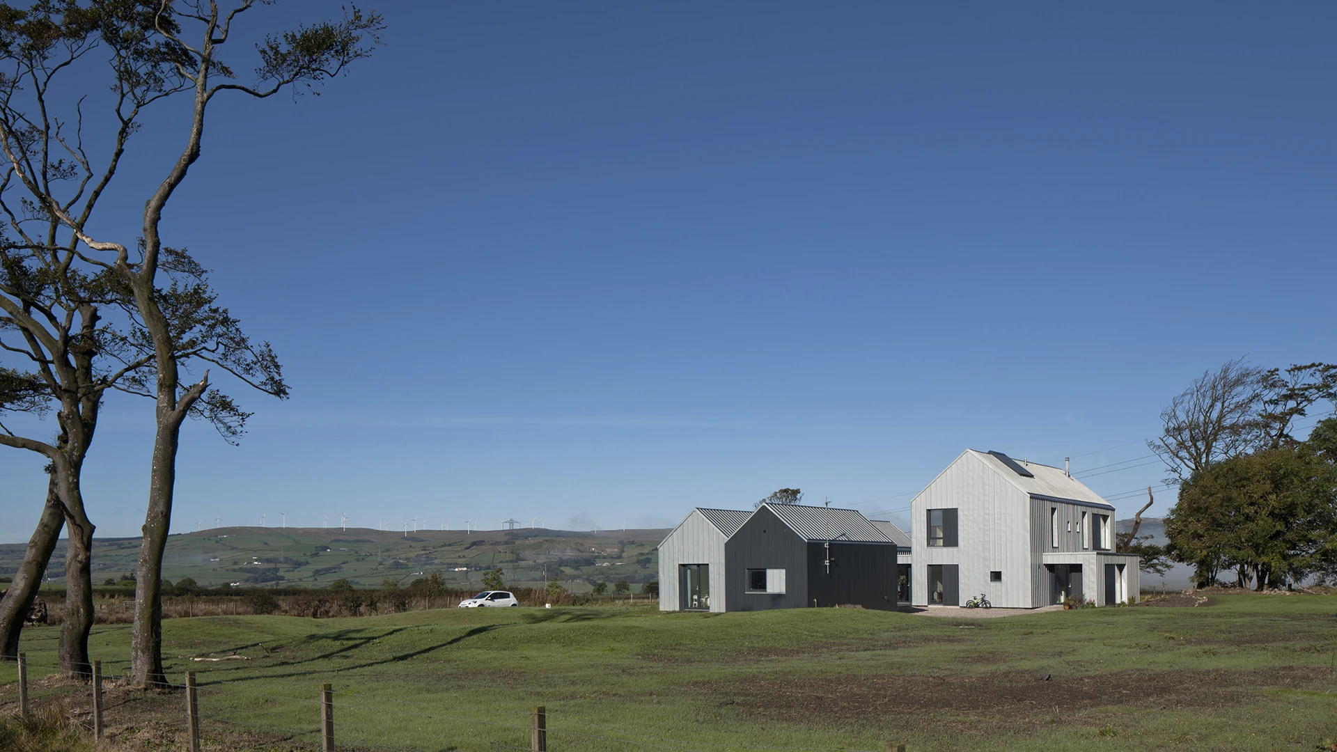 Newhouse of Auchengee is a contemporary farmhouse in North Ayrshire