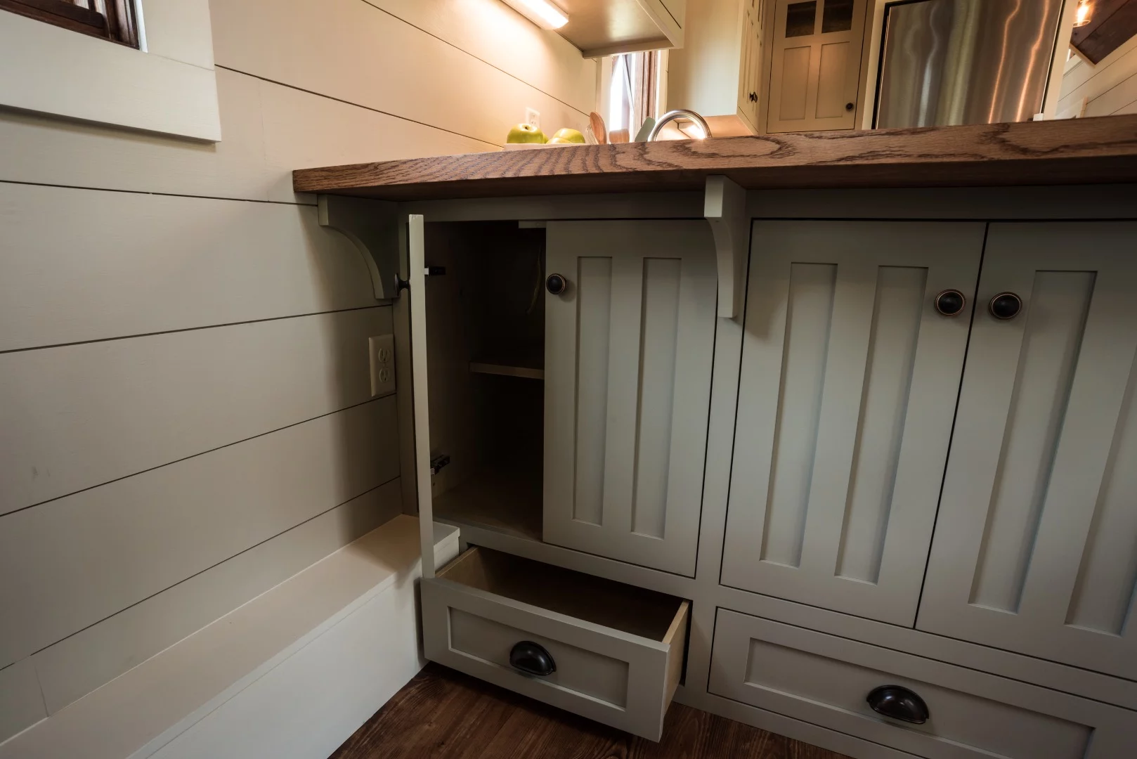 The Denali's kitchen features custom cabinetry