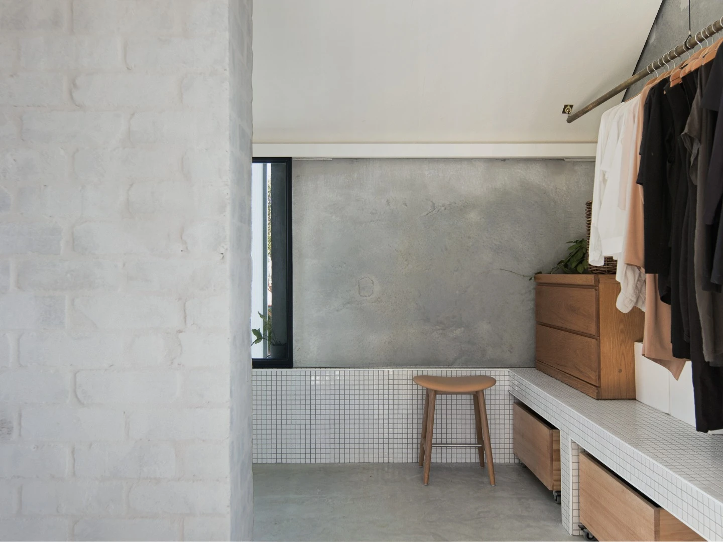 Open clothes rack keep sthe home feeling open and spacious