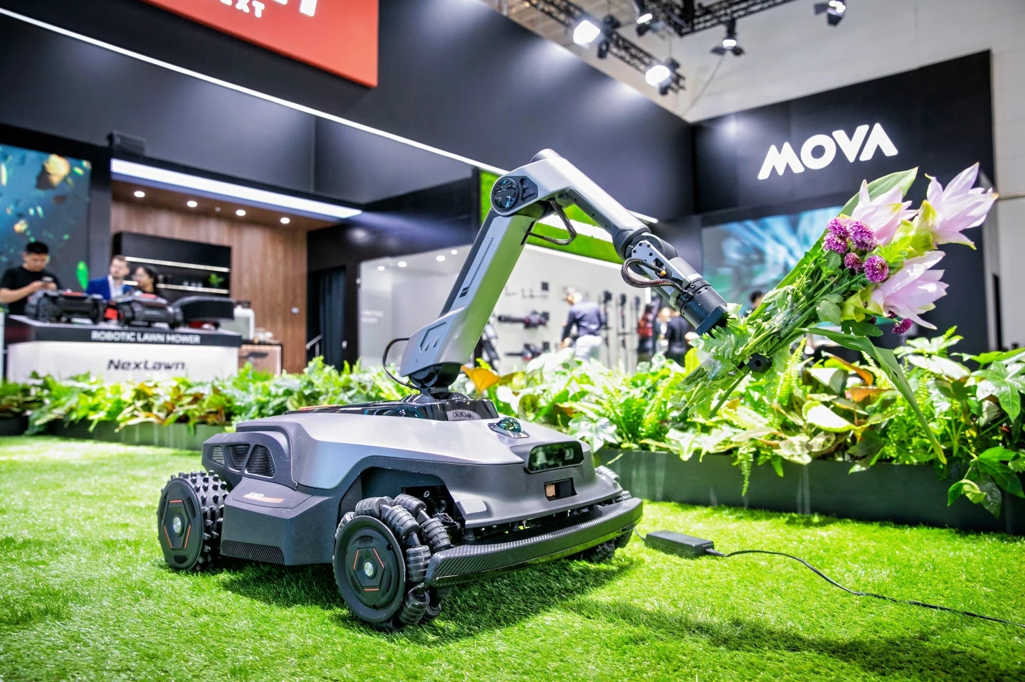 AWD autonomous mower set to become multi-tasking garden helper courtesy of robotic arm with swappable tools