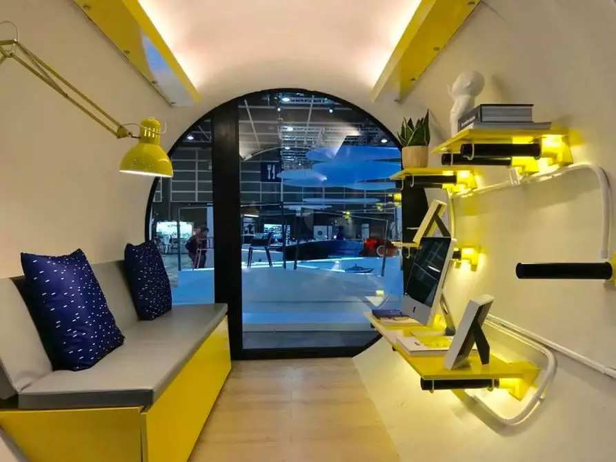 The snug interior of the OPod Tube House features an apartment-style layout suitable for one or two people